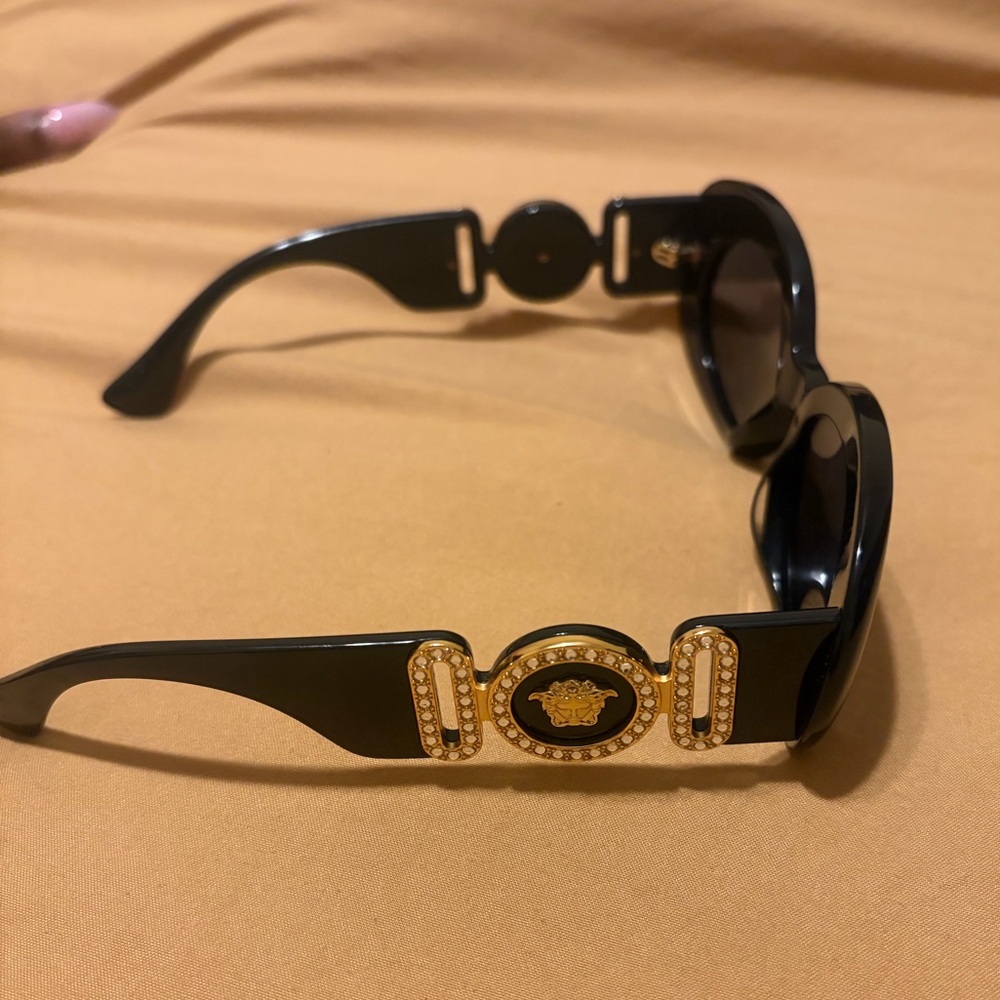 Black Designer-Style Sunglasses with Gold Medallion Accent